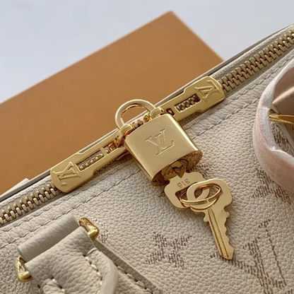 LV Speedy Bandoulière 25 Crème